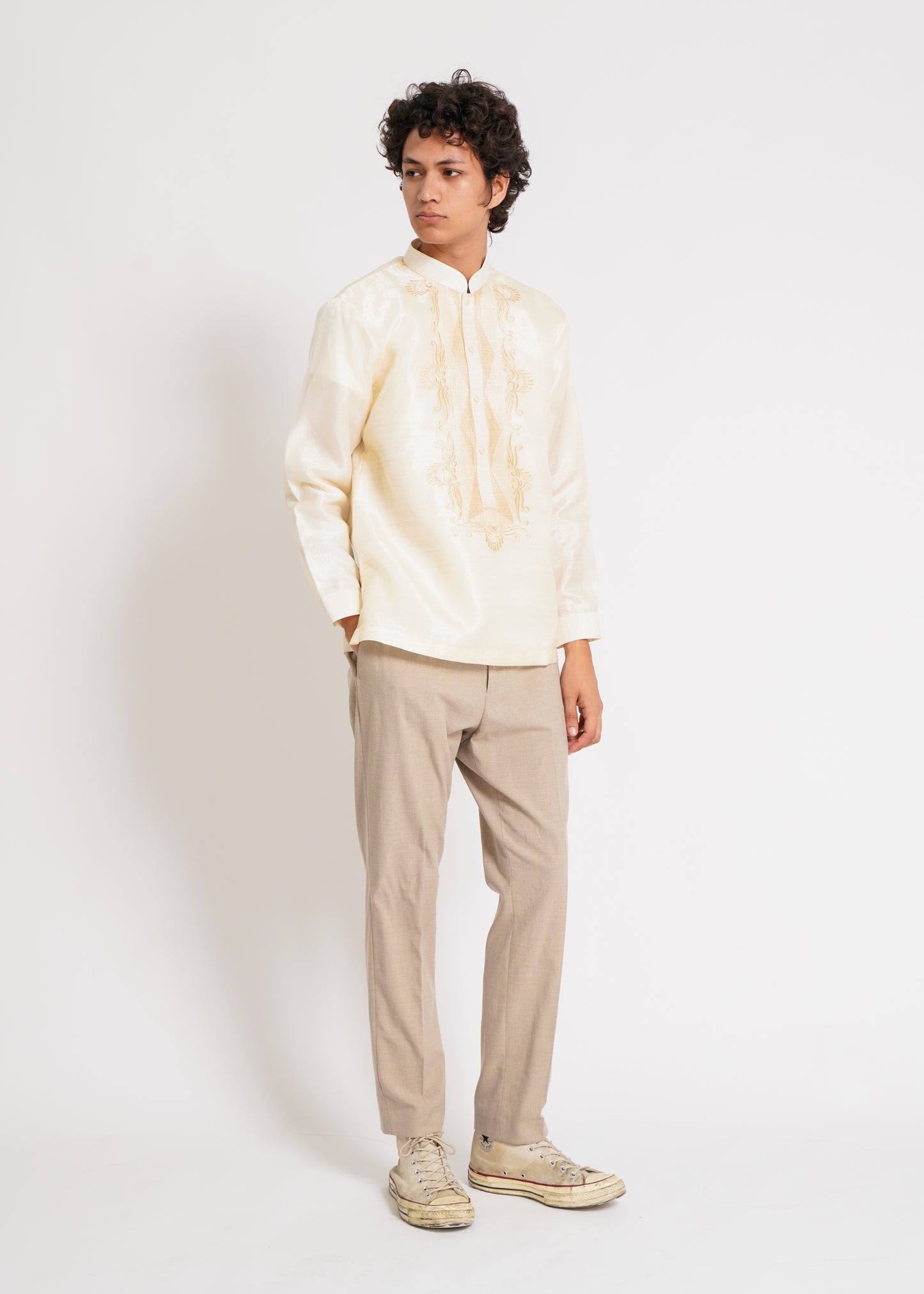 Alab Modern Barong – Upgraded. A minimalist masterpiece in soft cream with intricate floral details and a mandarin collar. Perfect with denim or slacks for a polished look