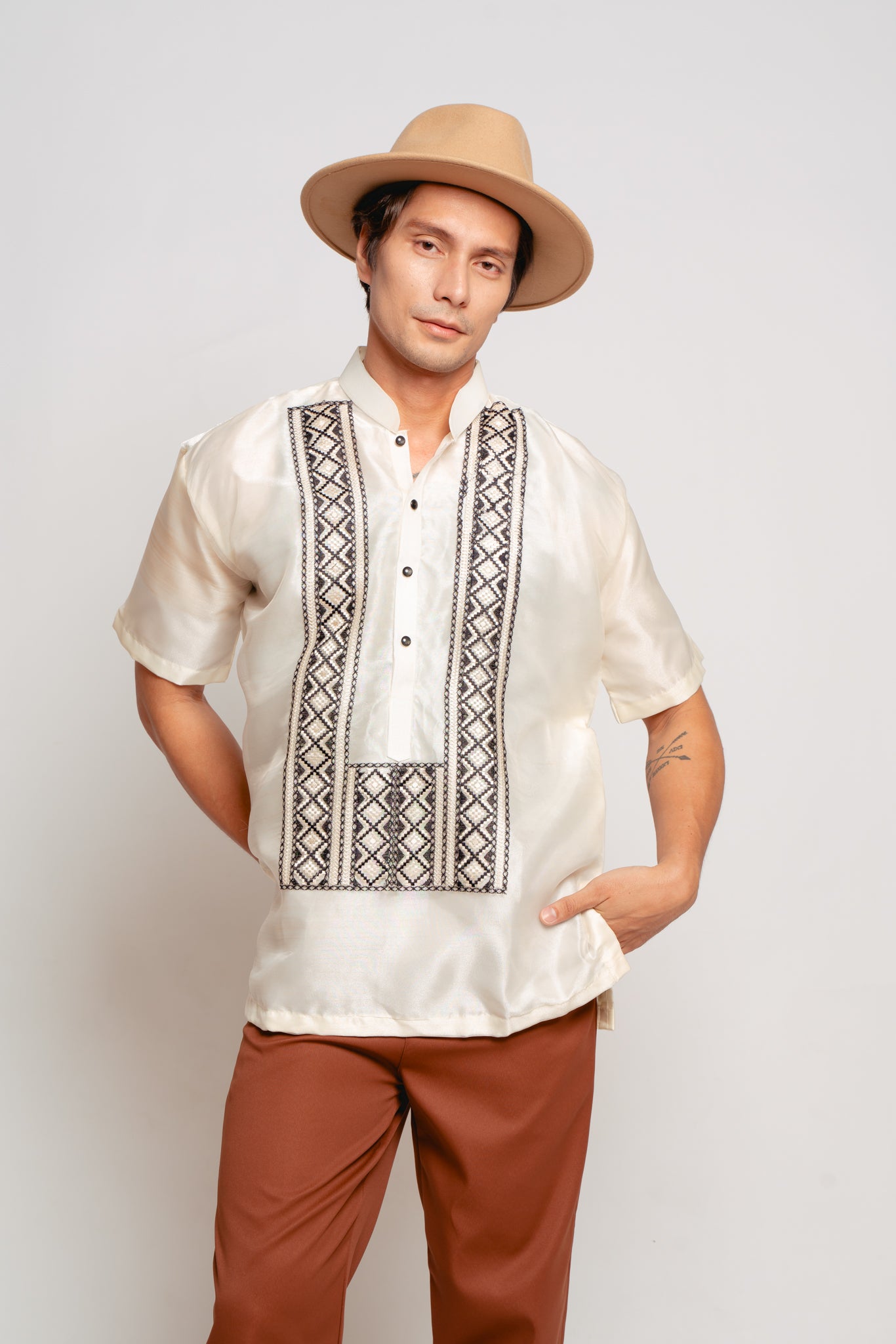 Carlo Short Sleeve Barong - Redone. Warmer days call for shorter sleeves. Our best-selling Dakila barong is now in airy piña organza with short sleeves. Perfectly balancing functionality and fashion, the Carlo Short Sleeve Barong keeps you polished even on the hottest days.
