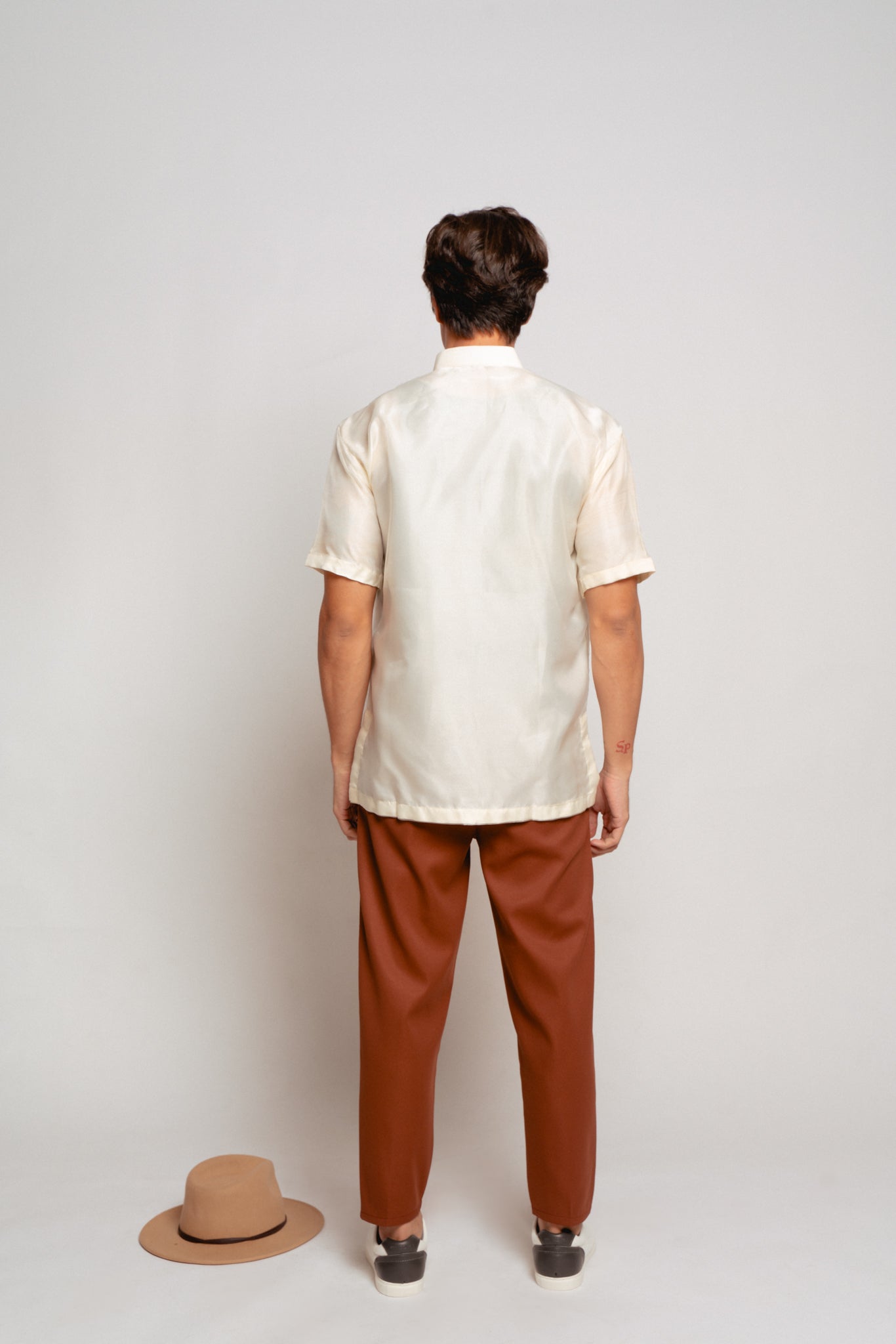 Carlo Short Sleeve Barong - Redone. Warmer days call for shorter sleeves. Our best-selling Dakila barong is now in airy piña organza with short sleeves. Perfectly balancing functionality and fashion, the Carlo Short Sleeve Barong keeps you polished even on the hottest days.