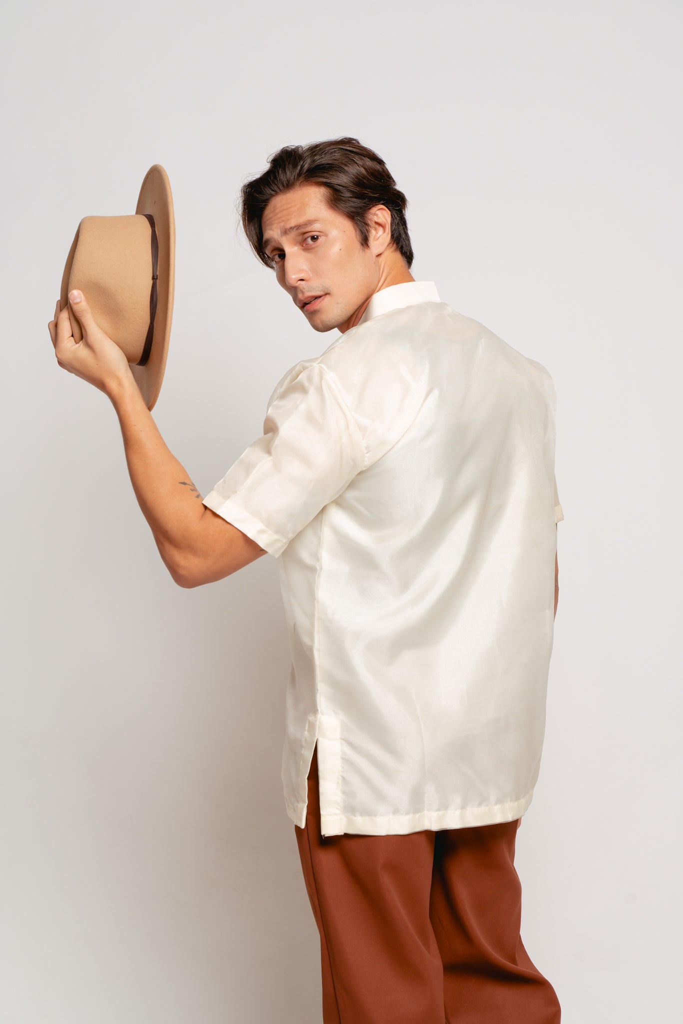 Carlo Short Sleeve Barong - Redone.  Warmer days call for shorter sleeves. Our best-selling Dakila barong is now in airy piña organza with short sleeves. Perfectly balancing functionality and fashion, the Carlo Short Sleeve Barong keeps you polished even on the hottest days.