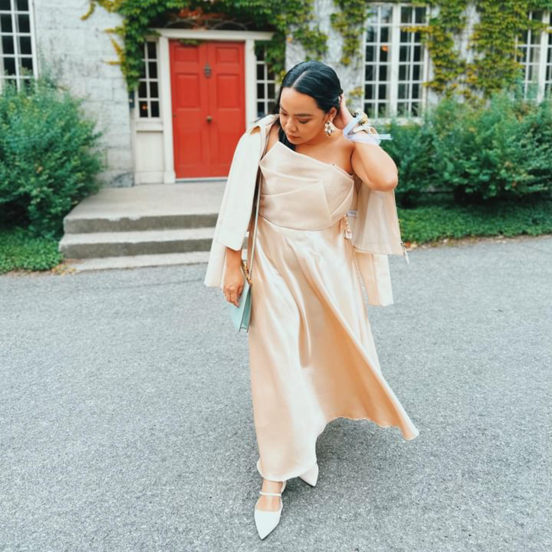 Zelina wears Bella satin skirt in champagne